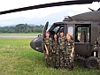 The Girls in Front of a Blackhawk
